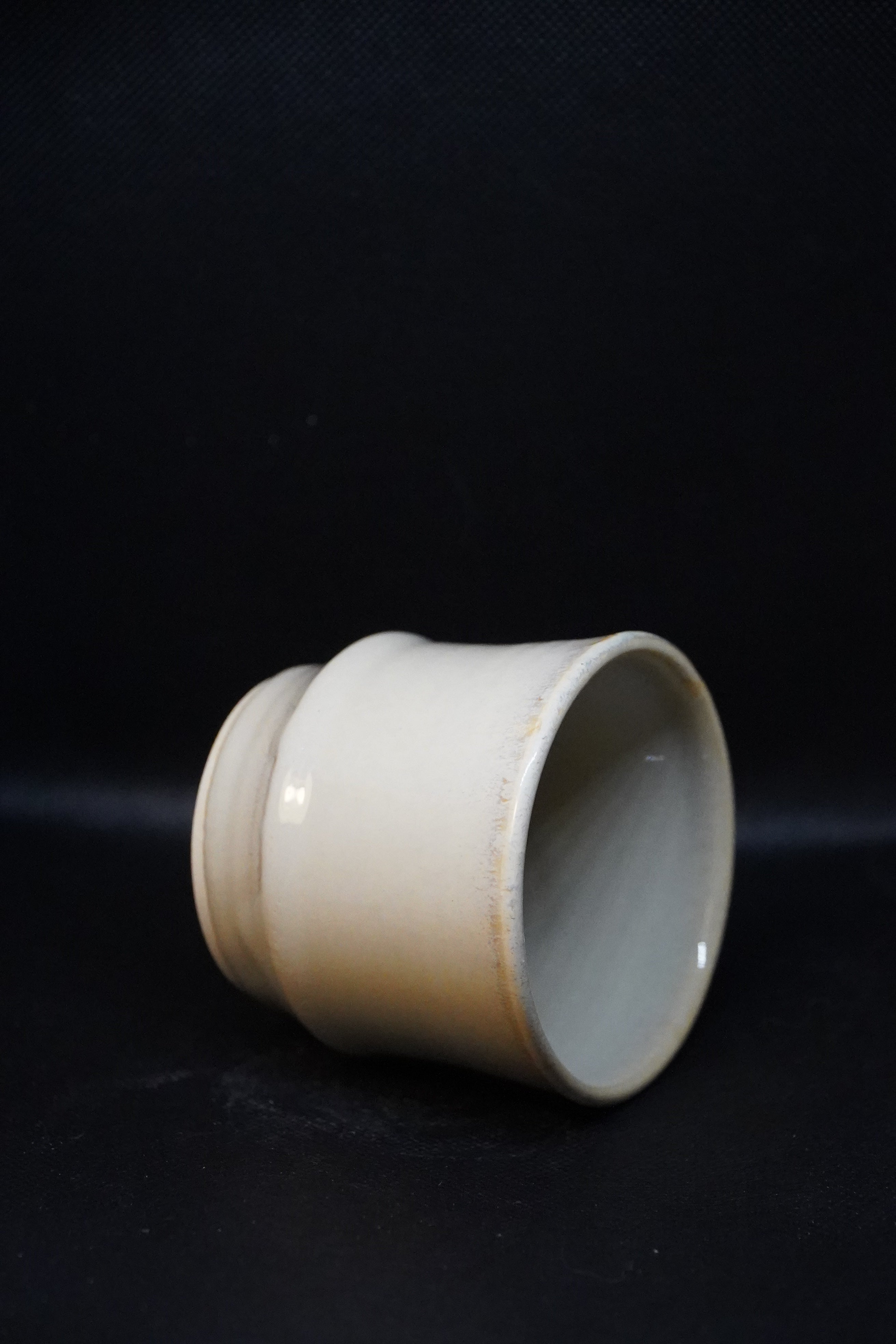 Handmade ceramic tea cup with shadow green and shorebreak glazing 250ml