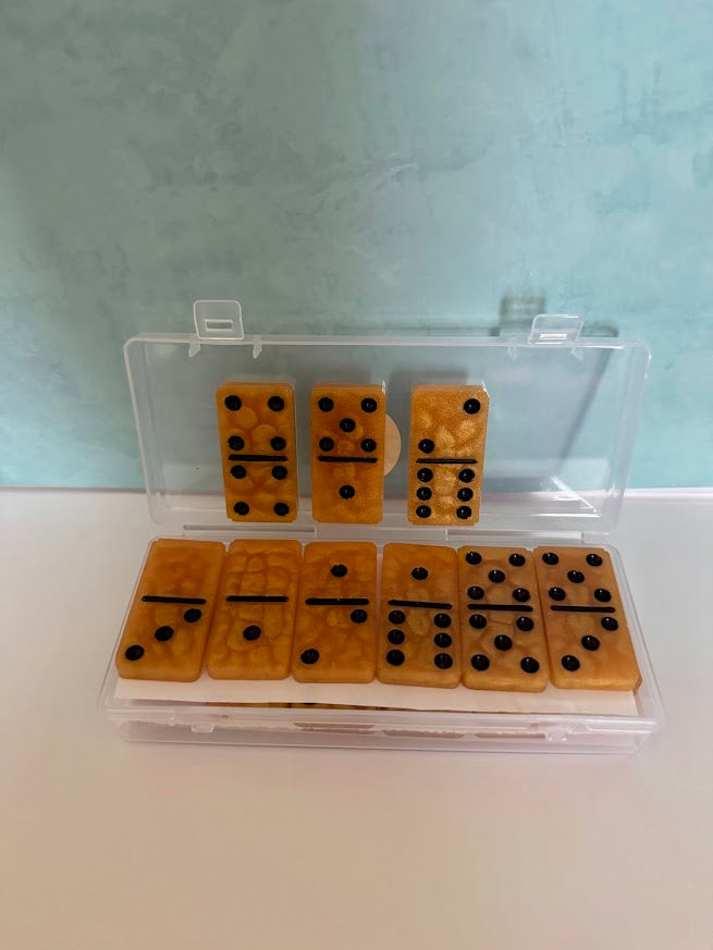 Dominos Gold/Black with a clear case